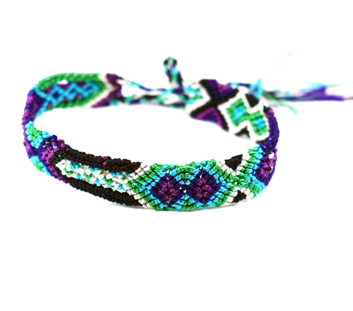 Tied DIY friendship bracelet with unusual braiding pattern on white  background Stock Photo - Alamy